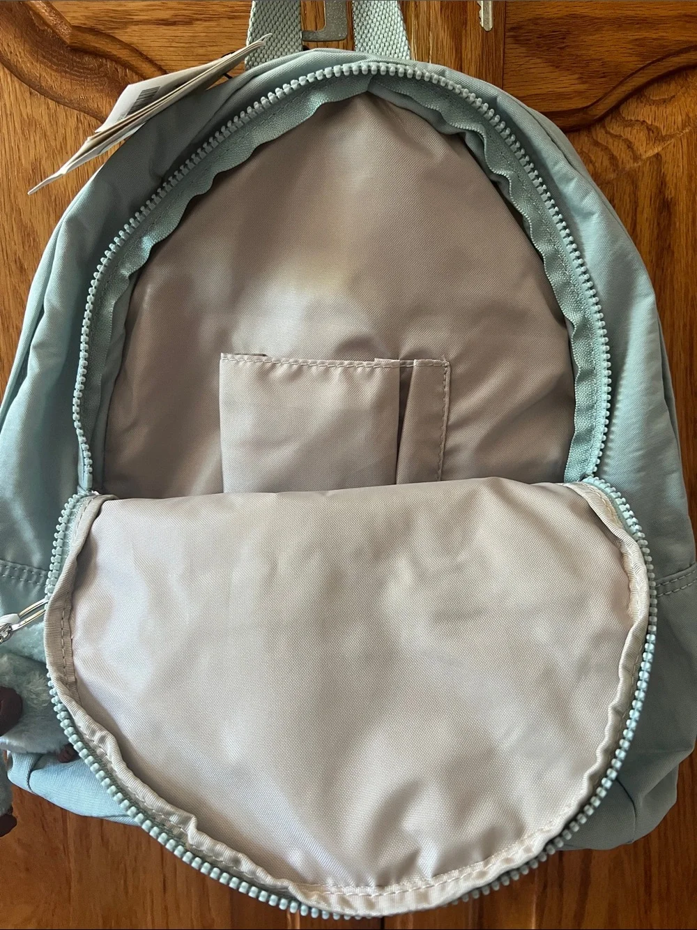 Kipling Light Blue  Backpack with Monkey Keychain